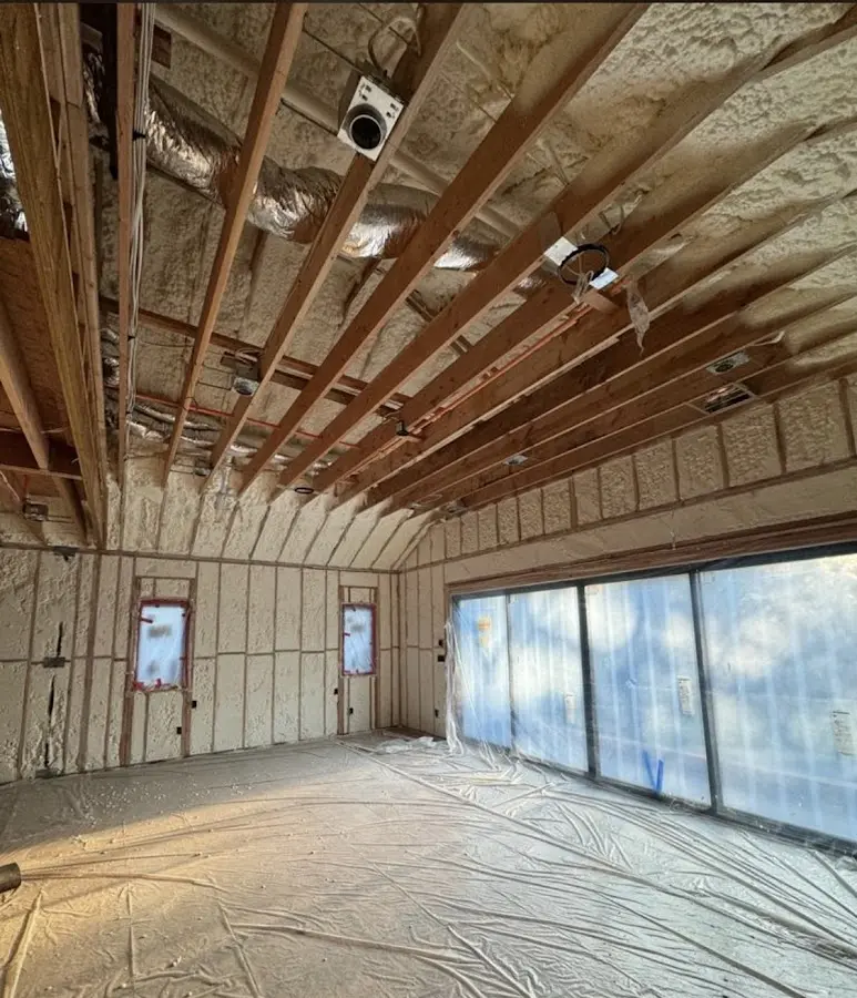 Interior walls and ceiling insulated with spray foam during new construction in Jennings Lodge